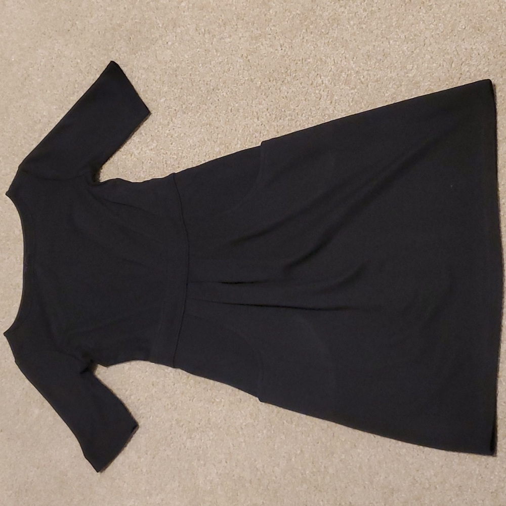 3/4 sleeve black dress with defined waist and pockets, size XS